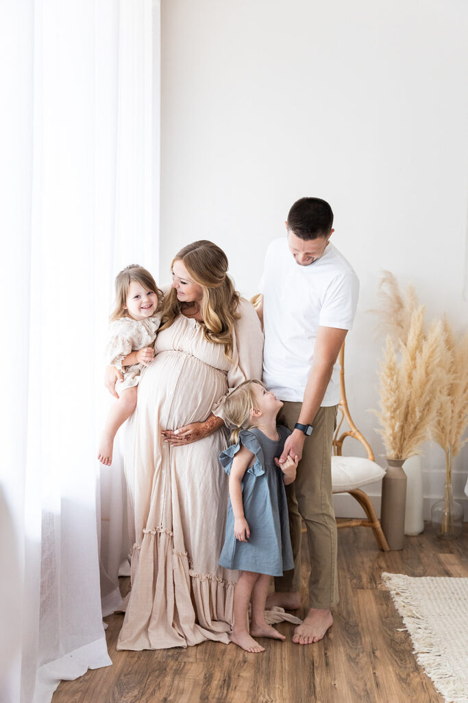 Family Maternity Pictures in Neutral Outfits