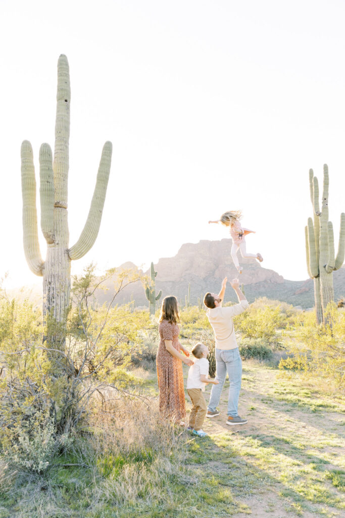 Family exploring the Phoenix desert during a photoshoot with Jennifer McRae Photography.