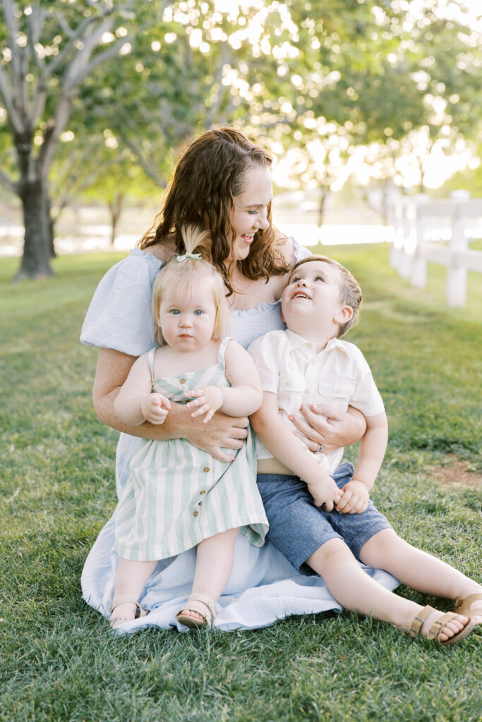 Sweet photo of a mother and her children by Gilbert Family Photographer