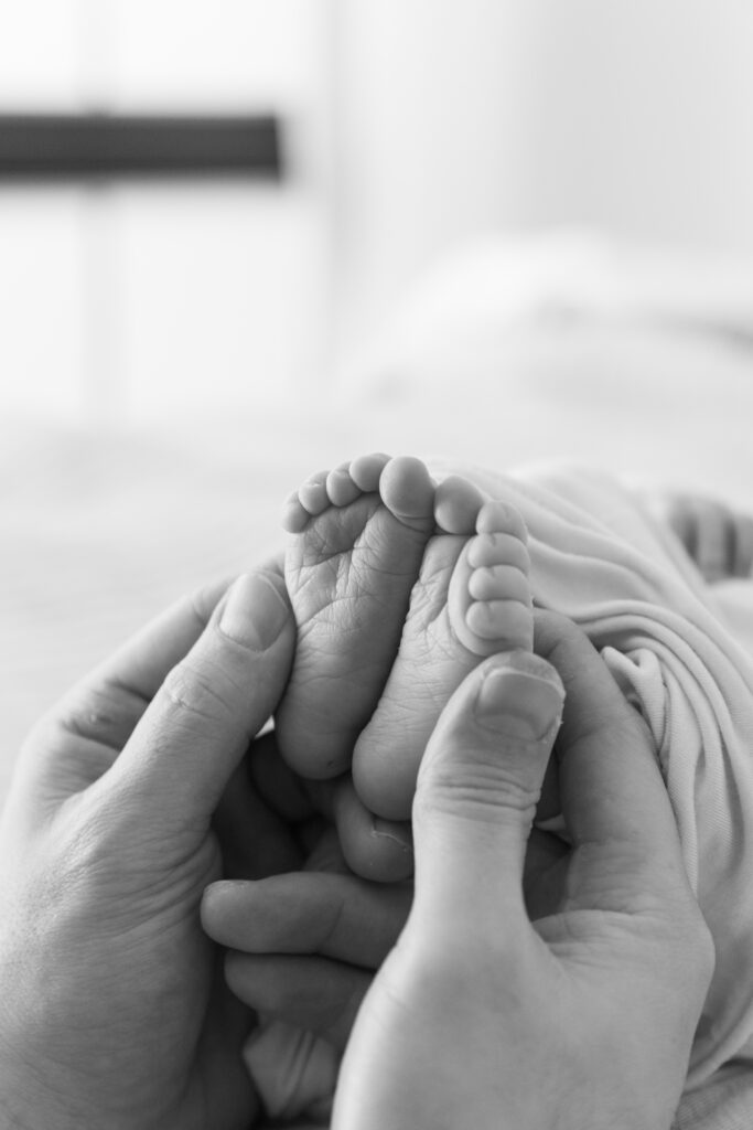 Close-up of baby's tiny toes during Scottsdale newborn photography shoot